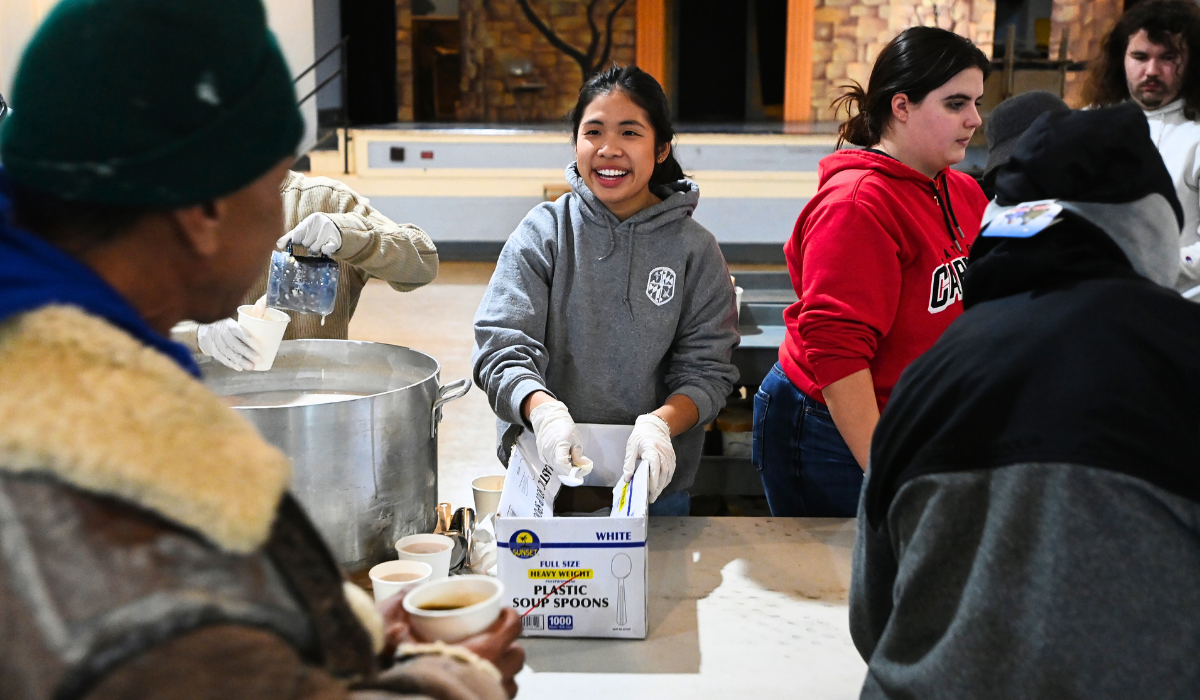 Student serving homeless