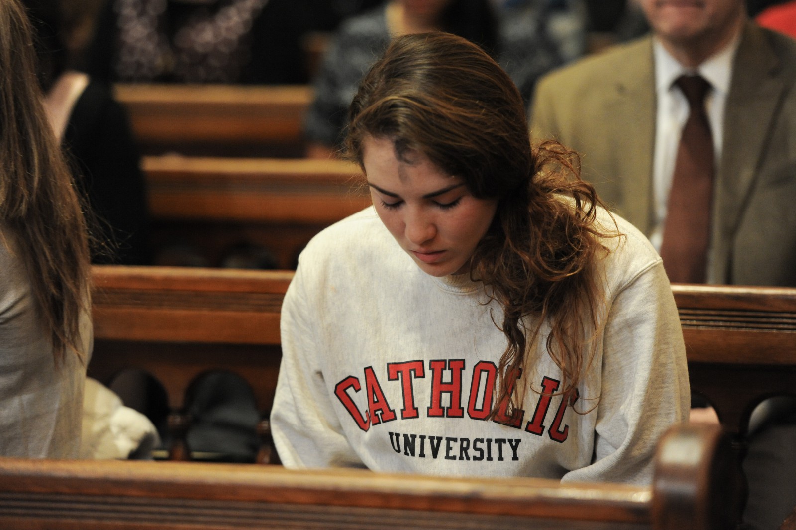 student praying on Ash Wednesday